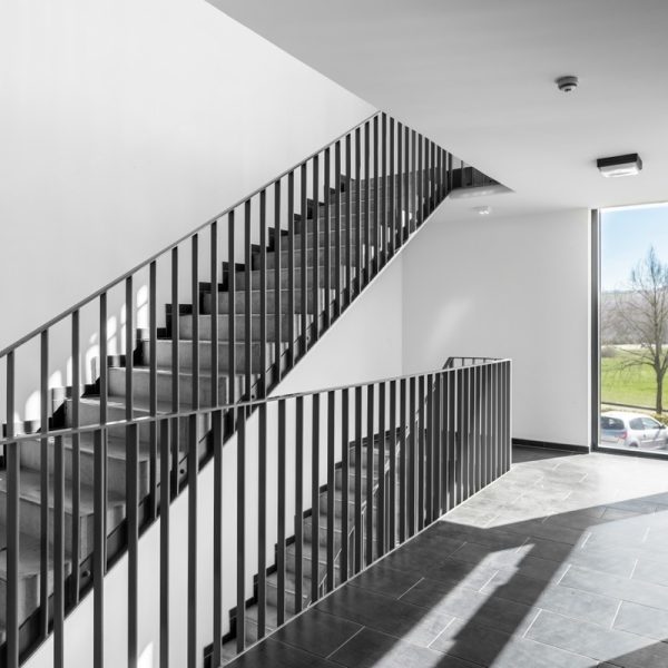 Bright stairwell with modern railings and natural light